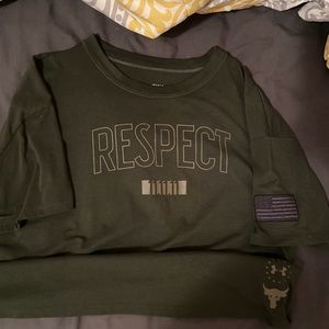 The rocks underarmour woman’s tshirt